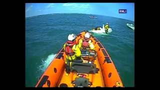 Poole lifeboat launch to capsized dinghy [upl. by Drahsar338]